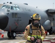 U.S. Air Force Staff Sgt. Matthew Slattery, lead firefighter with the 379th Expeditionary Civil Engineer Squadron’s Fire and Emergency Services Flight, completes a joint exercise at Al Udeid Air Base, Qatar, Aug. 1, 2017.