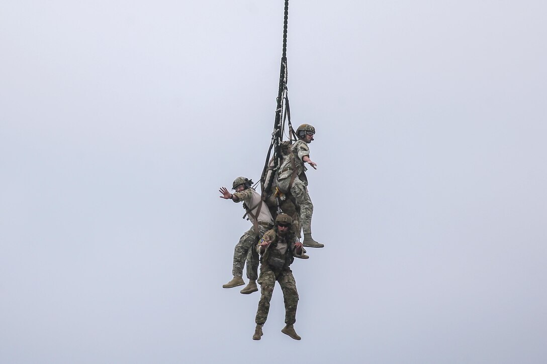 Guardsmen demonstrate a Special Patrol Insertion & Exfiltration System.