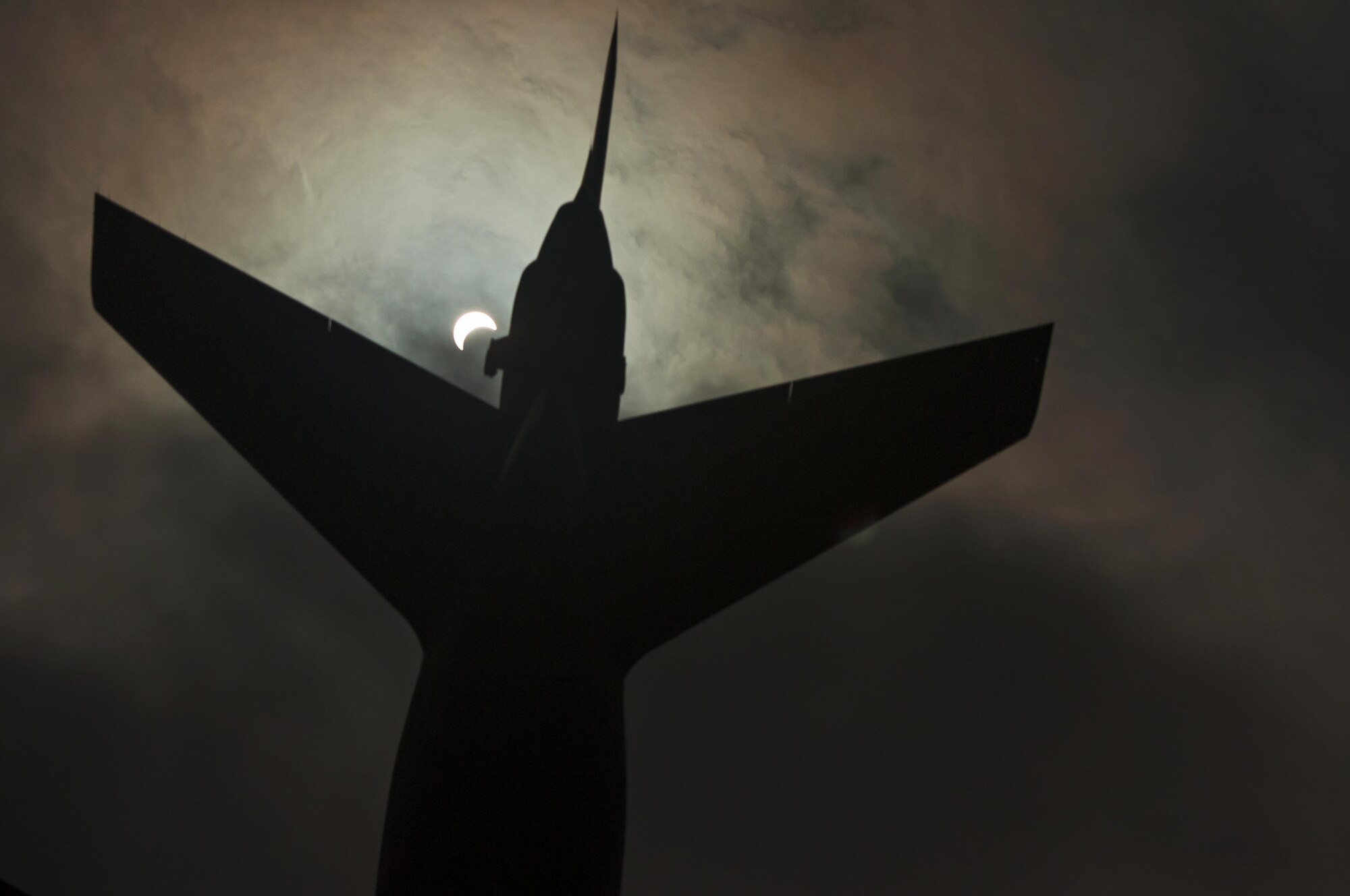 A KC-10 Extender approaches the landing strip at Joint Base McGuire-Dix-Lakehurst during the solar eclipse August 21, 2017. This is the first time a solar eclipse was viewable in the United States in about 40 years. (U.S. Air Force photo/Christian DeLuca)