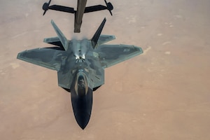 A 27th Expeditionary Fighter Squadron pilot disengages an F-22 Raptor from the boom of a 908th Expeditionary Air Refueling Squadron KC-10 Extender Aug. 22, 2017, in the skies over southwest Asia. As part of the Air Force Global Strike Task Force, members of the 27 EFS take the fight directly to ISIS. (U.S. Air Force photo by Senior Airman Preston Webb)