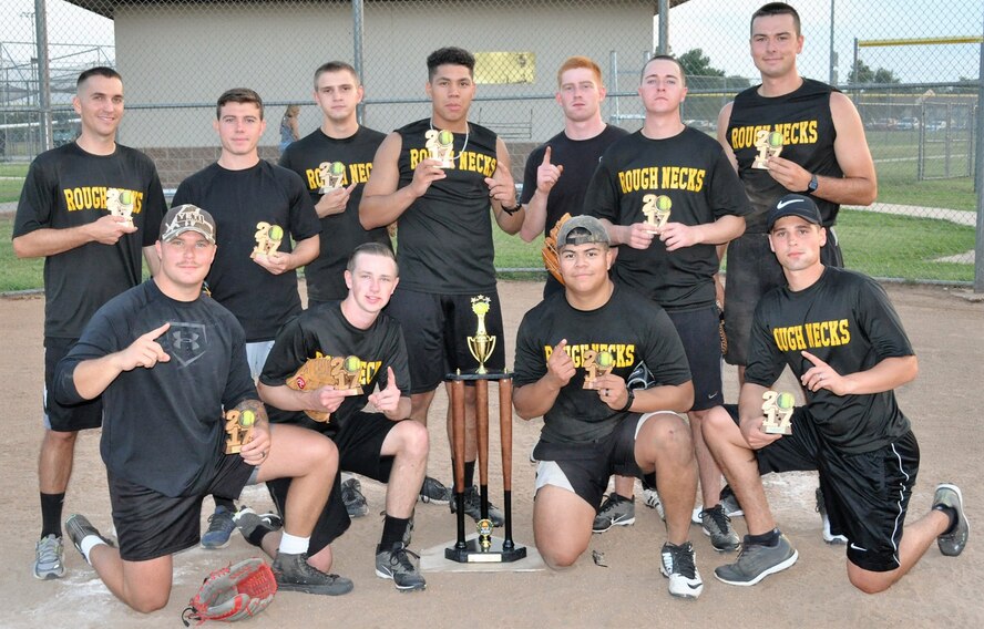 The VQ-7 RoughNecks show off their base championship trophies after defeating NGC in the final Aug. 8 on Field 2 south of the dorms.