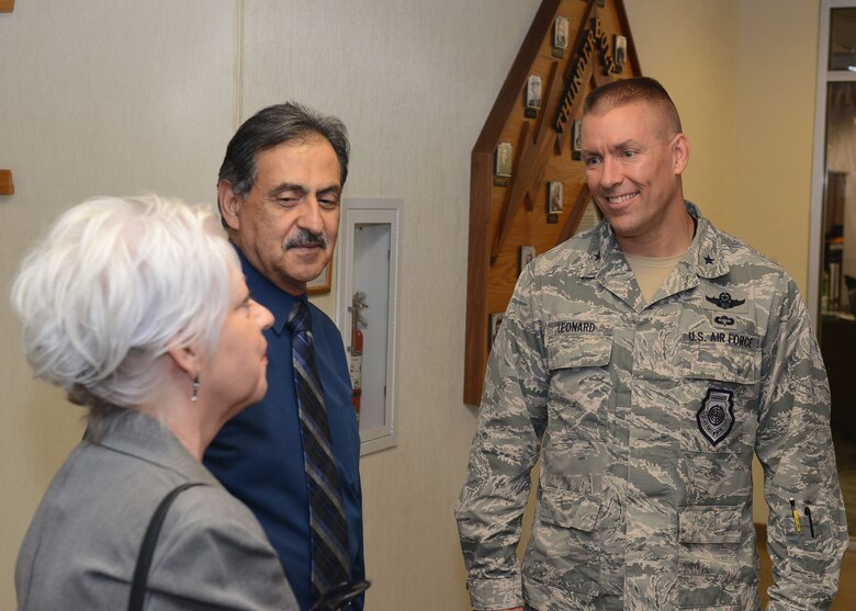 Brig. Gen. Brook Leonard, 56th Fighter Wing commander, talks with Sherry and Nick Fresques at Luke Air Force Base, Ariz., Aug. 18, 2017. The Fresques son Capt. Jeremy Fresques, 23rd Special Tactics Squadron special tactics officer, was killed in action in Iraq in 2005. The Fresques have become the first gold star family at Luke to apply for the Defense Biometric Identification System Card initiative allowing them access to the base and Airman and Family Readiness Center resources. (U.S. Air Force photo/Senior Airman James Hensley)