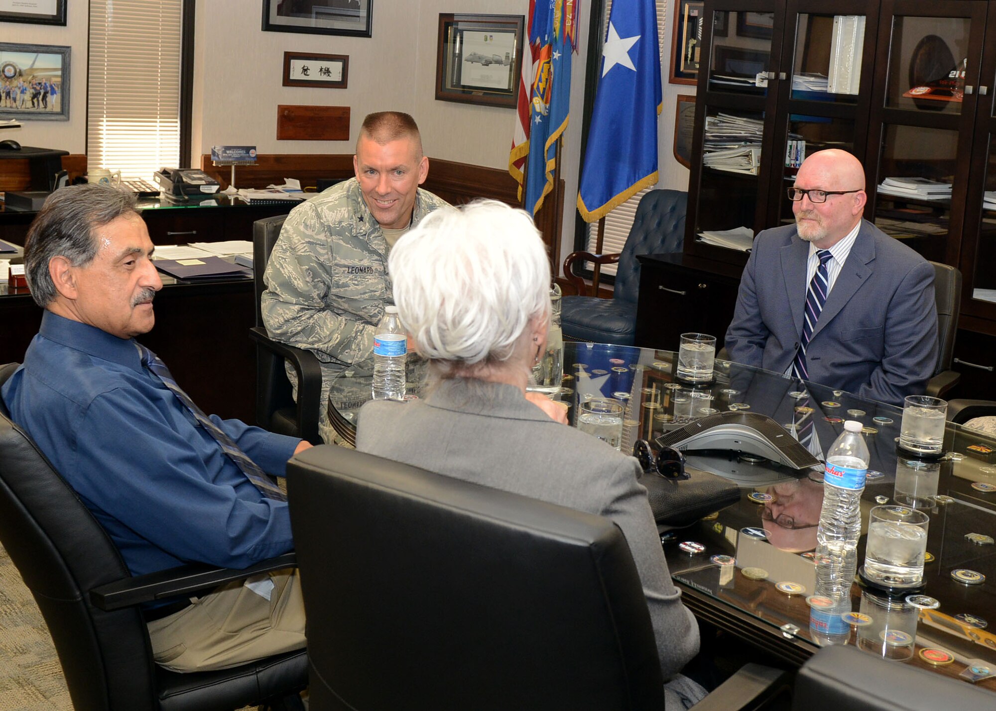 Brig. Gen. Brook Leonard, 56th Fighter Wing commander, talks with Sherry and Nick Fresques at Luke Air Force Base, Ariz., Aug. 18, 2017. The Fresques son Capt. Jeremy Fresques, 23rd Special Tactics Squadron special tactics officer, was killed in action in Iraq in 2005. The Fresques have become the first gold star family at Luke to apply for the Defense Biometric Identification System Card initiative allowing them access to the base and Airman and Family Readiness Center resources. (U.S. Air Force photo/Senior Airman James Hensley)