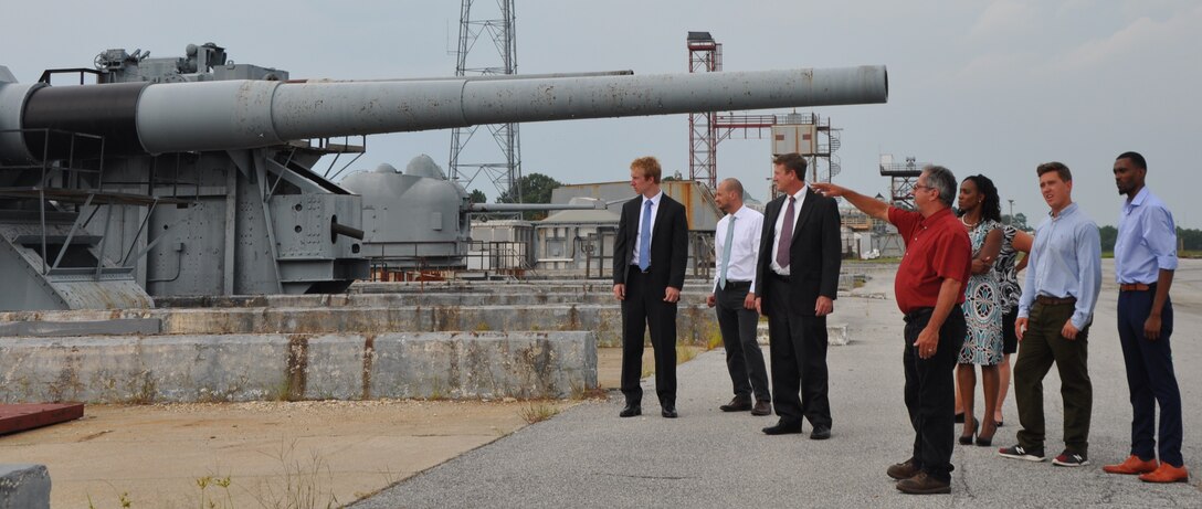 IMAGE: DAHLGREN, Va. (Aug. 21, 2017) - Jim Green, a Potomac River Test Range safety expert, points out the "firing bridge" to Science, Mathematics & Research for Transformation (SMART) Scholars as they tour the Naval Surface Warfare Center Dahlgren Division (NSWCDD) main range. "The firing directors and lookouts are in constant communication with range control, gun captains, test personnel and range boats during testing events for guns, lasers, and UAV's (unmanned aerial vehicles)," Green told the college students. "They are also in constant communication with our remote site called the Environmental Explosive Area where we do drop test, cook off test, shake and vibration, and many more types of tests." The Missile Defense Agency sponsored the college students who are among those pursuing a degree in, or closely related to, science, technology, engineering, and mathematics disciplines through the Department of Defense SMART Scholar program. Students selected for SMART Scholarships are offered internships and a stepping stone to future civilian job opportunities in the federal government.