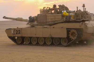 An M1A2 Main Battle Tank assigned to Bravo Company, 3rd Battalion, 8th Cavalry Regiment, 3rd Armored Brigade Combat Team, 1st Cavalry Division maneuvers toward the after-action review site after conducting an early morning area defense at Udairi Range Complex during the company's situational training exercise Aug. 12, 2017. The STX was used to validate the unit through mission essential tasks to sustain the readiness of the combined arms battalions.   (U.S. Army photo by Staff Sgt. Leah R. Kilpatrick)