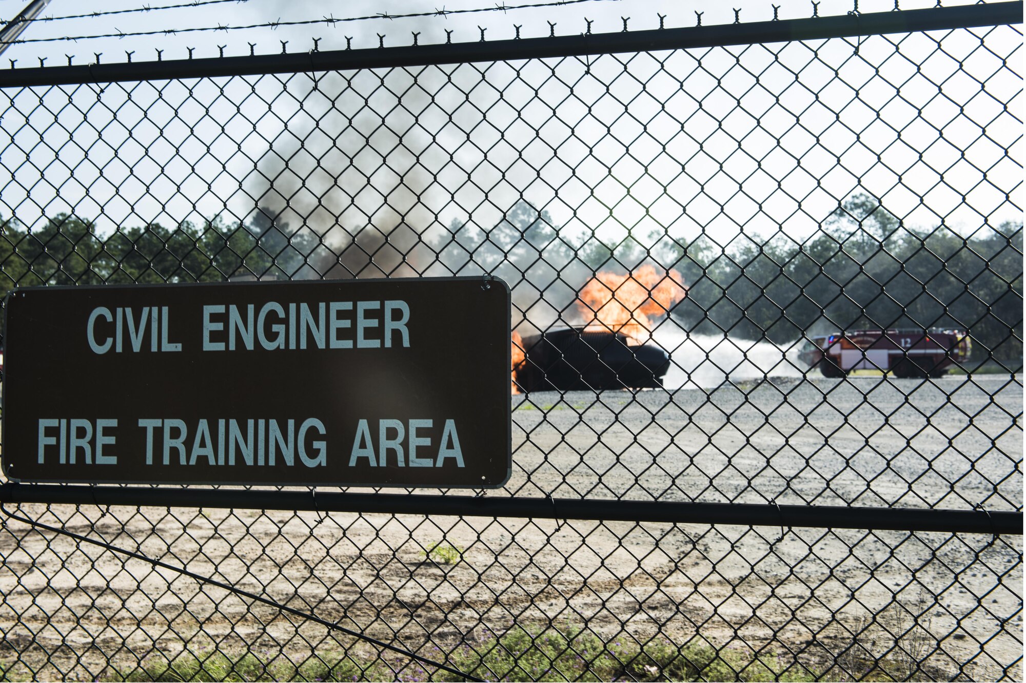 Firefighters from the 23d Civil Engineer Squadron conduct live fire training at Moody Air Force Base, Ga., Aug. 24, 2017. All of Moody’s firefighters are required to perform this training at least once a year. (U.S. Air Force photo by Staff Sgt. Olivia Dominique)