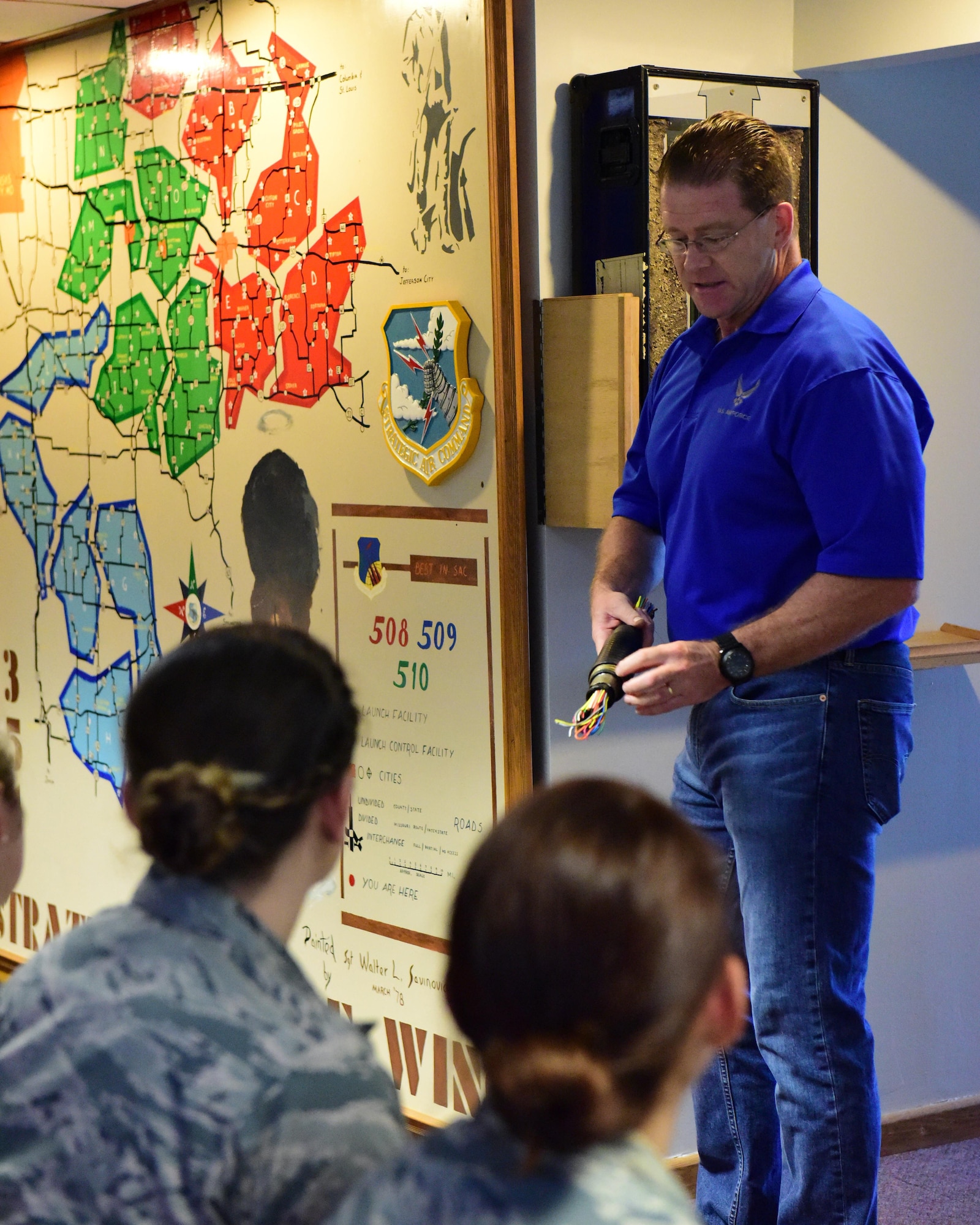 David Grisdale, the director of historical property assigned to the 509th Bomb Wing, tour the Airmen through Oscar-1 to help them understand Whiteman's history and involvement during the Cold War.