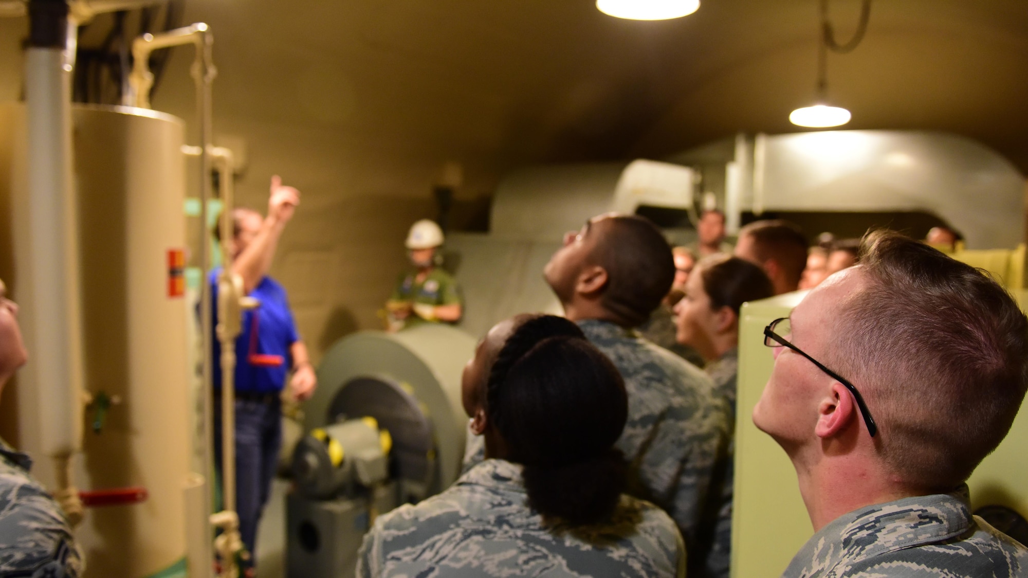 David Grisdale, the director of historical property assigned to the 509th Bomb Wing, shows First Term Airmen Course Airmen a section of the Oscar-1 Minuteman Missile Alert Facility at Whiteman Air Force Base, Mo., Aug. 10, 2017. The tour was to help the Airmen understand Whiteman's history and involvement during the Cold War.