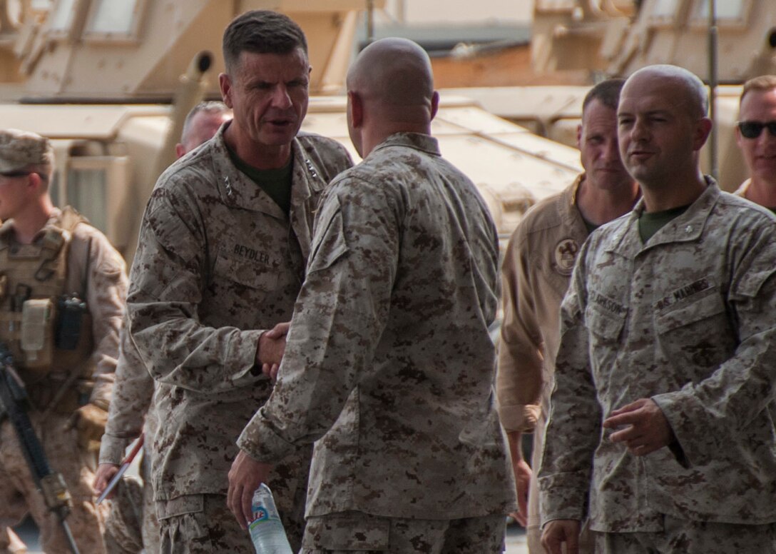 U.S. 5TH FLEET AREA OF OPERATIONS (Aug. 17, 2017) U.S. Marine Lt. Gen. William D. Beydler, commanding general of Marine Forces Central Command (MARCENT), greets with Marines of Marine Wing Support Squadron (MWSS), All-Weather Fighter Attack Squadron (VMFA) 224 and Deployed Joint Command and Control (DJC2). Lt. Gen. Beydler and Sgt. Maj. William T. Thurber, MARCENT Sergeant Major, visited the Marines to address evolving topics in the future of the Marine Corps. (Photo by Mass Communication Specialist 3rd Class Alex J. Cole)
