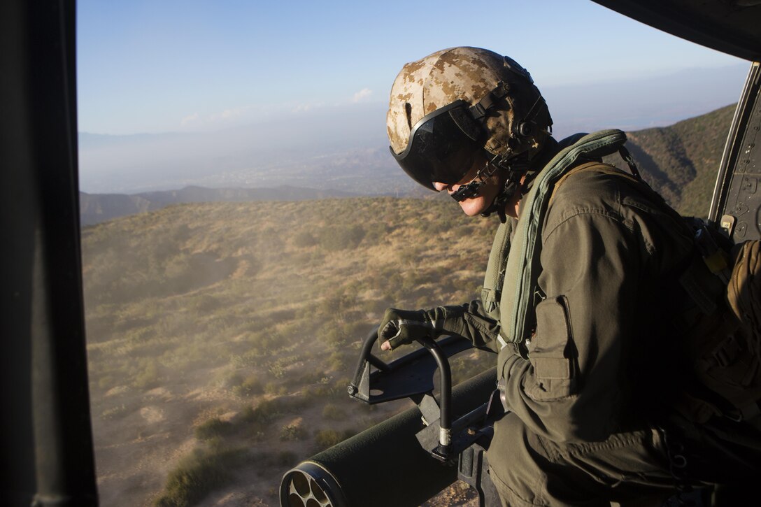 A UH-1Y with Marine Light Attack Helicopter (HMLA) 469 provides close air support during a simulated tactical recovery of aircraft and personnel (TRAP) mission on Marine Corps Base Camp Pendleton, Calif., Aug. 23. HMLA-469’s pilots gained valuable experience through this realistic training that can be applied while forward deployed.