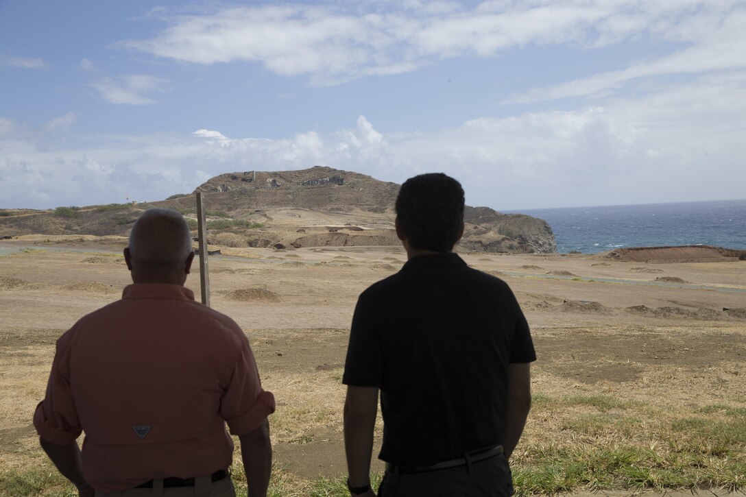 Sen. Brian Schatz, Hawaii, and Mr. Dan Geltmacher, manager, Range Training Area Management, observe ranges aboard Marine Corps Base Hawaii (MCBH), Aug. 24, 2017. Schatz traveled to MCBH to discuss and learn more about concerns regarding capabilities, readiness, and future challenges to U.S. Marines in the region and discussed the projection of power, production of readiness, and promotion of resiliency with current and future military projects. (U.S. Marine Corps photo by Sgt. Alex Kouns/Released)