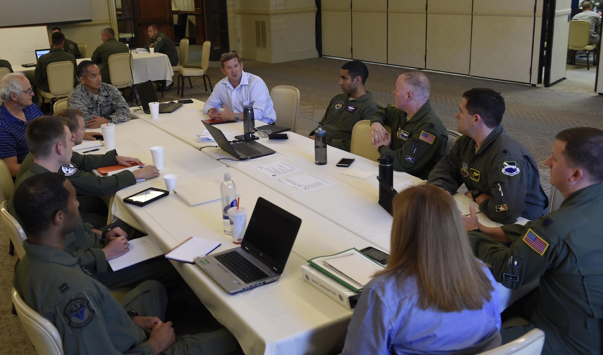 Lt. Col. Langdon Root, Aircrew Crisis Task Force Summit lead, conducts a briefing Aug. 15 during a two-week aircrew retention summit here as part of a holistic approach to improve readiness and capacity by increasing retention of experienced aviators.