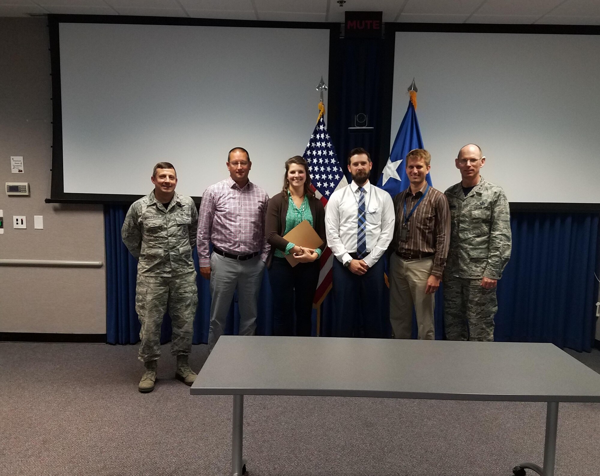 The Air Force Life Cycle Management Center’s Presidential Aircraft Recapitalization Directorate headquartered here, recently signed a contract to purchase two commercial Boeing 747-8s, which will become part of the next Air Force One fleet. Members of the team include from left, Col. Dan Marticello, Mike Lekan, Amy Johnson, James Patterson, Brian Hale, and Maj. Gen. Duke Richardson. (U.S. Air Force photo/ Brian Brackens)