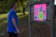 Tech Sgt. Jason White, 4th Communication Squadron quality assurance NCO in charge, reads a poster during the Women’s Equality Day 5k walk, August 25, 2017, at Seymour Johnson Air Force Base, North Carolina. The walk helps educate participants on the history of inequality of women. (U.S. Air Force photo by Airman 1st Class Victoria Boyton)