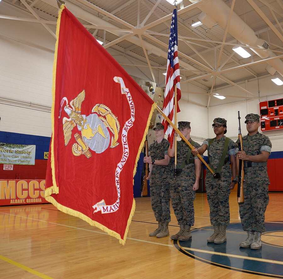 Sgt. Hope Timberlake, postal clerk, Post Office, Marine Corps Logistics Base Albany, is a member of the installations color guard and carries the organizational colors during practice, Aug. 20. She as meritoriously promoted to her current rank during a ceremony held here, Aug. 2.