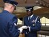 Senior Airman Sean Flanigan, 790th Missile Security Forces Squadron response force leader, performs a two-man flag fold with Airman 1st Class Kevin Antoine, 90th Missile Maintenance Squadron missile maintenance technician, at F.E. Warren Air Force Base, Wyo., Aug. 24, 2017. A two-man flag fold is done at veteran funerals. The F.E. Warren Base Honor Guard mission is to provide military honors for deceased active duty, retired and veteran members, and support base and community events. (U.S. Air Force photo by Airman 1st Class Breanna Carter)