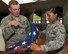 Senior Airman Sean Flanigan, 790th Missile Security Forces Squadron response force leader, instructs Airman 1st Class Ebony Barnes, 90th MSFS security forces member, during an honor guard practice at F.E. Warren Air Force Base, Wyo., Aug. 24, 2017.  Flanigan assists with instructing members on how to properly perform military honors. The F.E. Warren Base Honor Guard mission is to provide military honors for deceased active duty, retired and veteran members, and support base and community events. (U.S. Air Force photo by Airman 1st Class Breanna Carter)