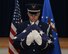 Senior Airman Sean Flanigan, 790th Missile Security Forces Squadron response force leader, cradles a flag at F.E. Warren Air Force Base, Wyo., Aug. 23, 2017. Flanigan has dedicated more than 50 hours to funerals and ceremonies while serving with the honor guard. The F.E. Warren Base Honor Guard mission is to provide military honors for deceased active duty, retired and veteran members, and support base and community events. (U.S. Air Force photo by Airman 1st Class Breanna Carter)