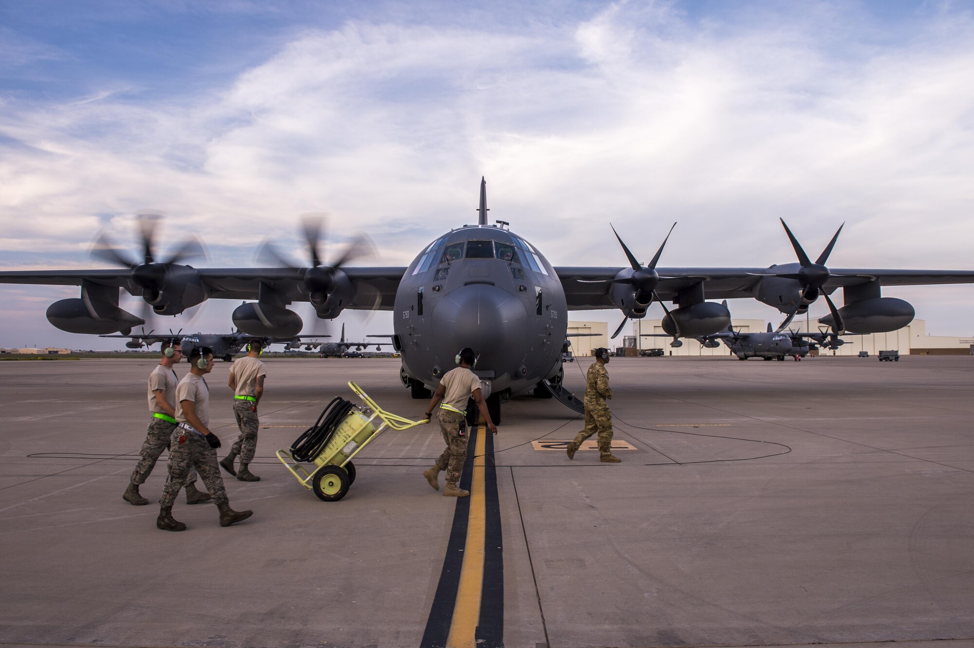 An engine-start check is performed prior to an MC-130J Commando II takeoff for night operations from Cannon Air Force Base, New Mexico, Aug. 23, 2017. This aircraft provides low-level air refueling capabilities and infiltration and exfiltration of troops into hostile territories. (U.S. Air Force photo by Staff Sgt. Charles Dickens/Released)