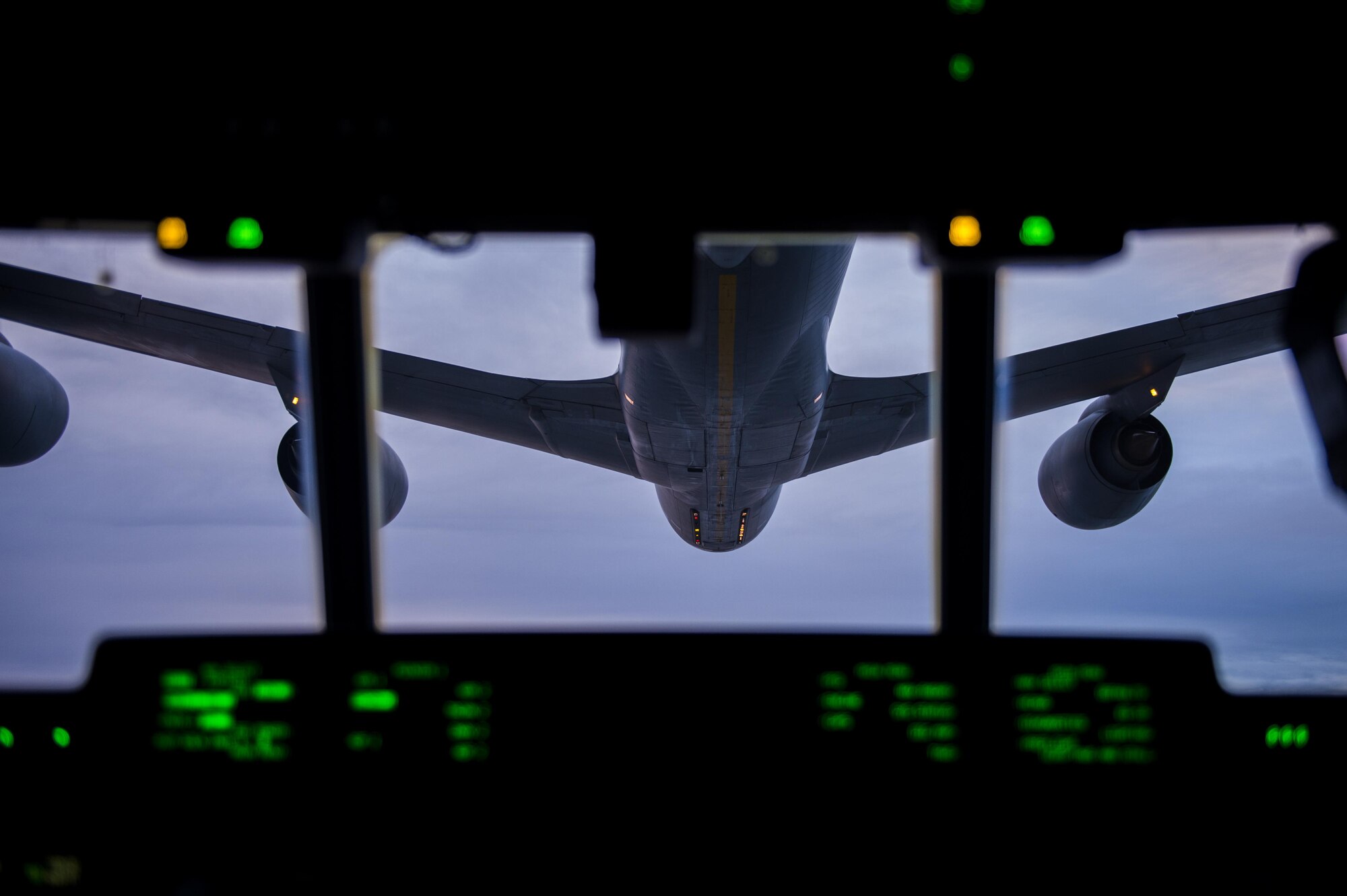 A KC-135 Stratotanker prepares to refuel an MC-130J Commando II during an aerial refueling mission over New Mexico on Aug. 23, 2017. During aerial refueling missions, the aircraft must maintain precision accuracy to ensure proper fuel transfer. (U.S. Air Force photo by Staff Sgt. Charles Dickens/Released)