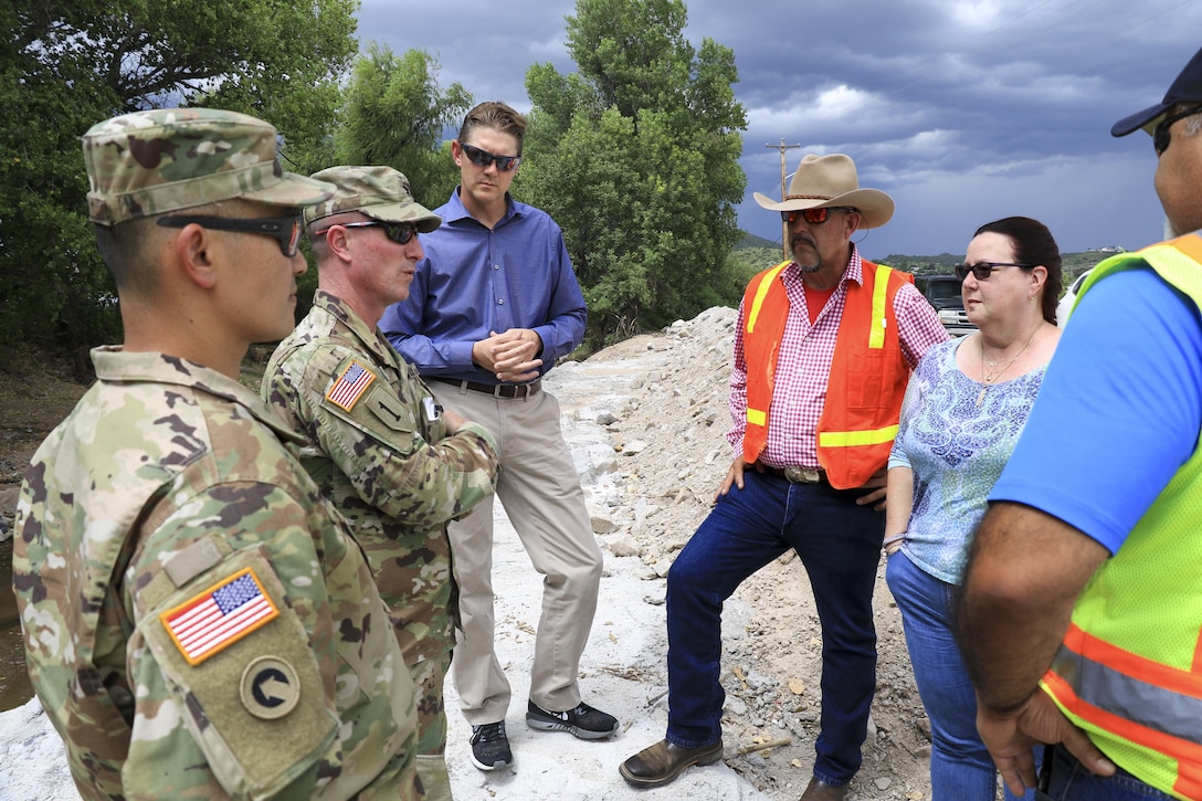 U.S. Army Corps of Engineer Los Angeles District Commander Col. Kirk Gibbs visits District personnel and response sites to personally thank Corps, National Guard and local team members Aug. 23. The Corps responded to the emergency by providing technical advice and direct flood fight assistance.