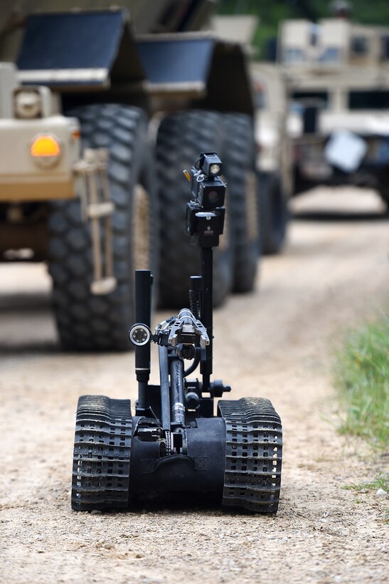 A Talon, operated by Sgt. Michael Case from the 349th Civil Engineer Squadron, searches for explosive devices, after a simulated explosively formed projectile hit their convoy during a joint operation at Combat Support Training Exercise 86-17-02 at Fort McCoy, Wisconsin, from August 5 – 25, 2017.