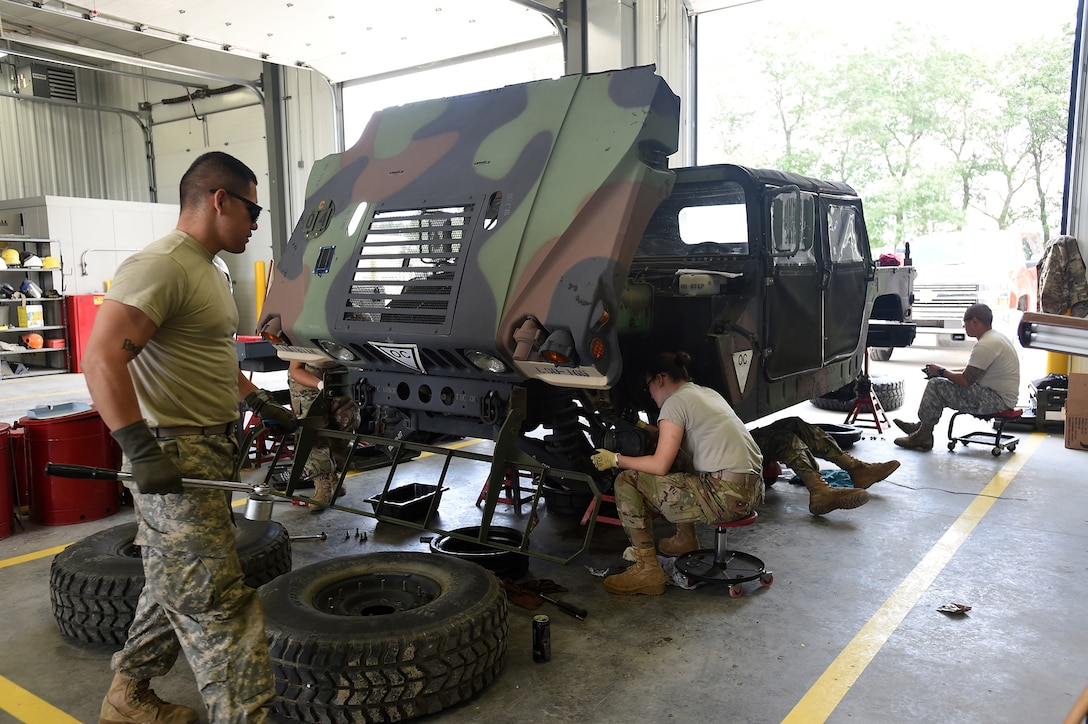 Army Reserve wheeled vehicle mechanics assigned to the 950th Support Maintenance Company conduct annual service on observer coach/trainer humvees as part of their mission to support the shop during Combat Support Training Exercise 86-17-02 at Fort McCoy, Wisconsin, from August 5 – 25, 2017.