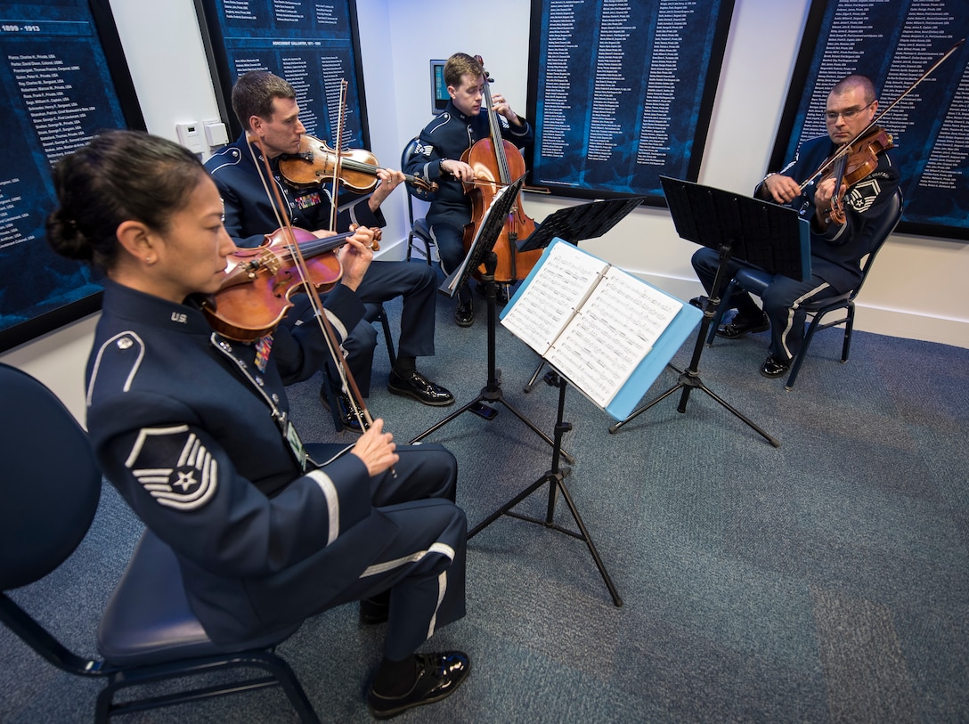 The Air Force Strings provide the music for the retirement of Colonel Jonathan P. Davis in the Pentagon's Hall of Heros this week. The Air Force Band frequently sends small chamber groups out for these types of ceremonies. (U.S. Air Force photos/AFDW/released)