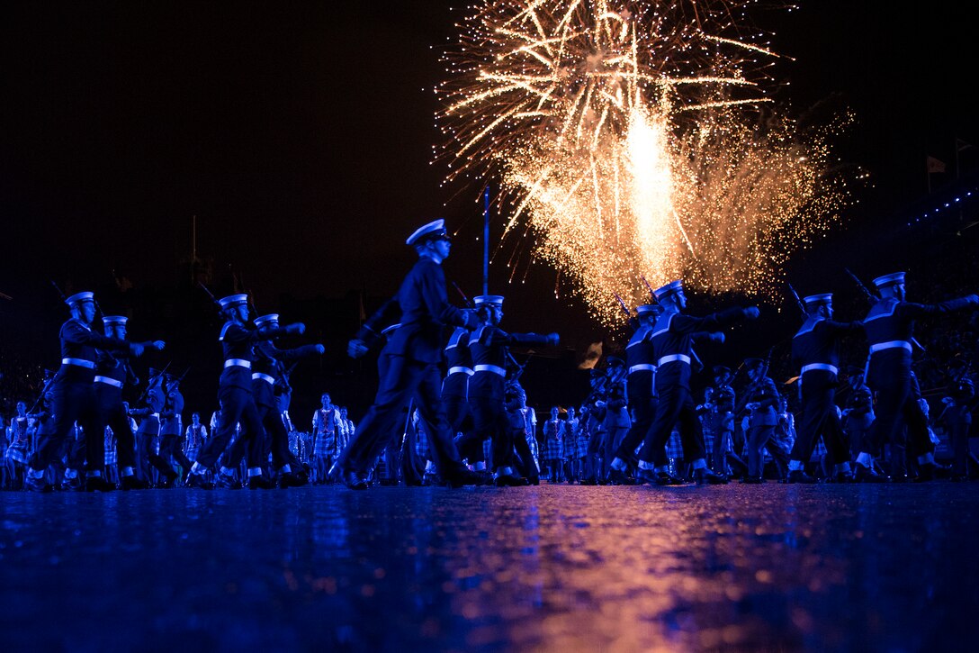 Royal Navy sailors march off to fireworks at the Royal Edinburgh Military Tattoo in Scotland.