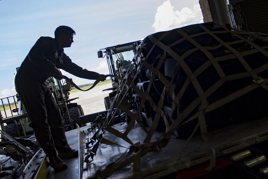 U.S. Air Force Staff Sgt. Todd Johnson, 347th Operations Support Squadron weapons and tactics loadmaster, secures a pallet of equipment in preparation for rescue operations following Hurricane Harvey, Aug. 25, 2017, at Moody Air Force Base, Ga.