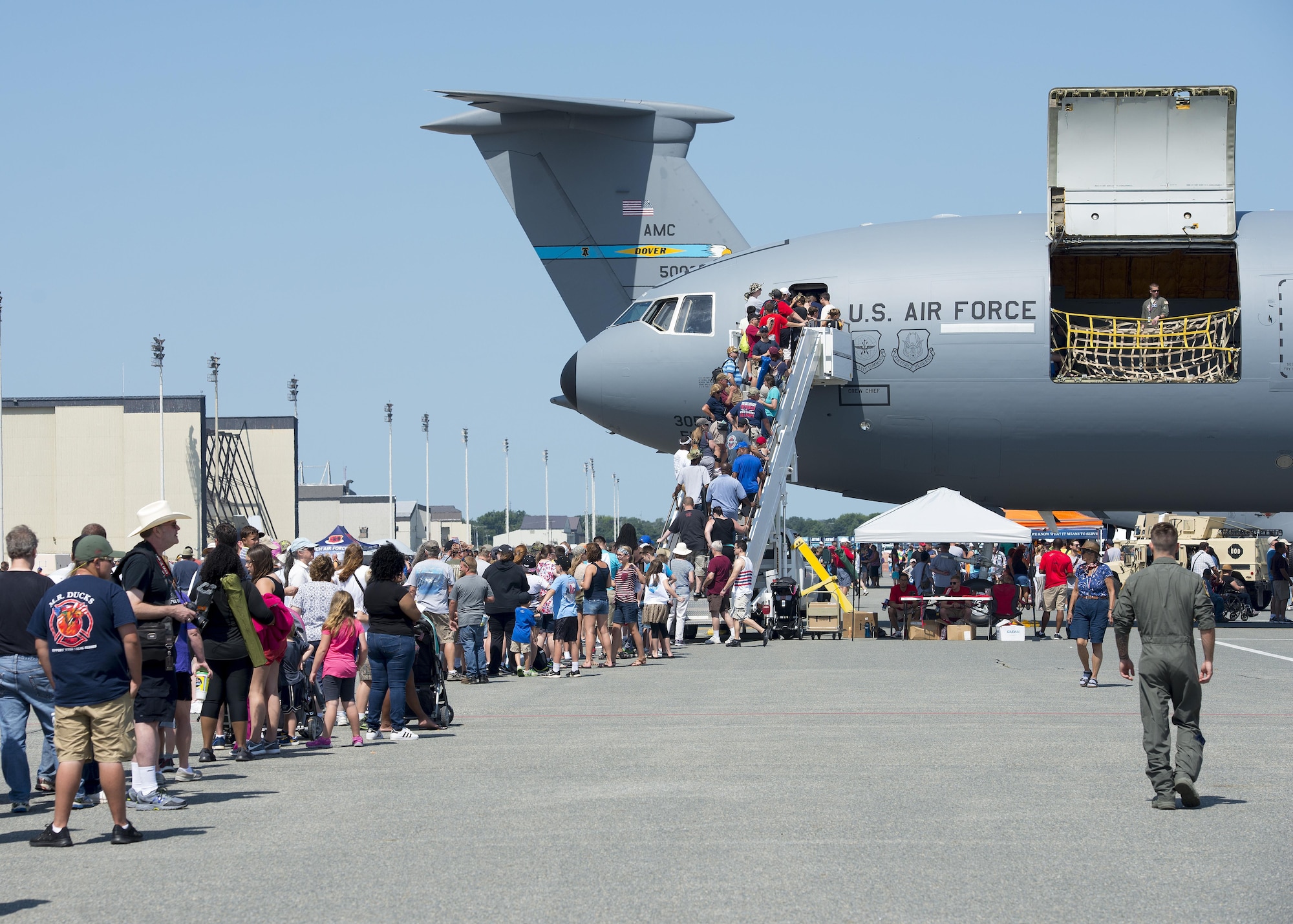 Attendees file in line to enter a KC-10 Extender during the Thunder Over Dover Open House Aug. 26, 2017, at Dover Air Force Base, Del. This KC-10 is assigned to Joint Base McGuire-Dix-Lakehurst, N.J. (U.S. Air Force photo by Senior Airman Zachary Cacicia)