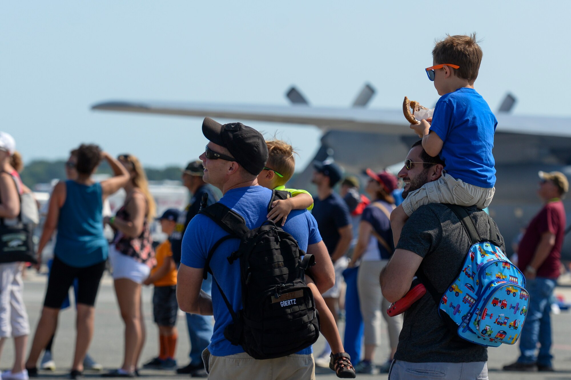 Guests of Team Dover watch aerial performers Aug. 26, 2017, from the flightline on Dover Air Force Base, Del., during the Thunder Over Dover Open House. Nearly 30,000 community members attended the opening day of the two-day event. (U.S. Air Force photo by Staff Sgt. Aaron J. Jenne)