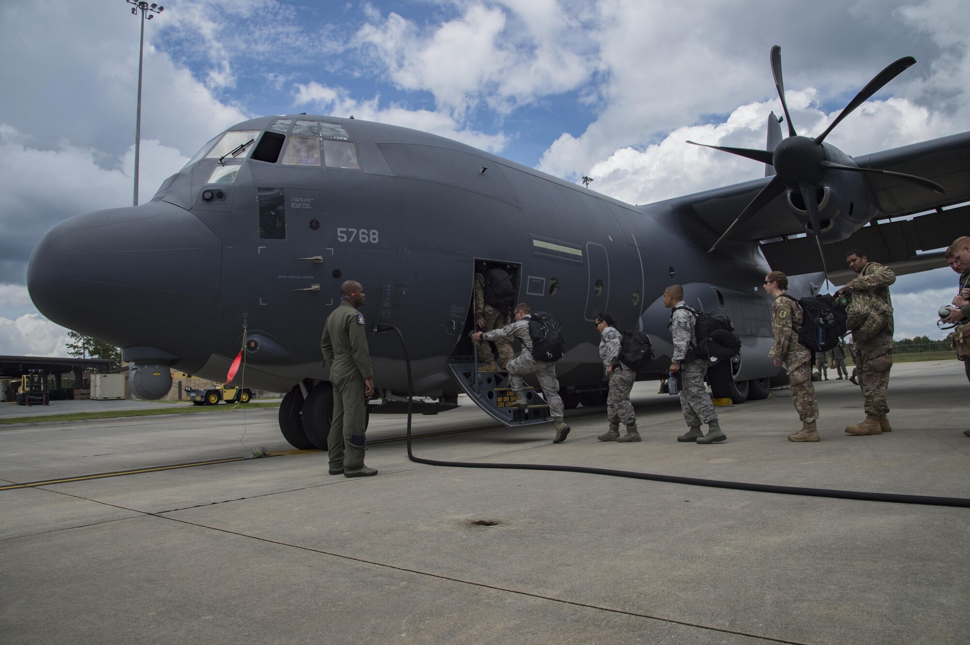 U.S. Air Force members from the 71st and 41st Rescue Squadrons board a HC-130J Combat King II traveling to Texas in preparation of possible hurricane relief support August 26, 2017, at Moody Air Force Base, Ga.
