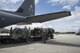 U.S. Air Force members from the 23d Wing direct cargo to be loaded on to a HC-130J Combat King II traveling to Texas in preparation of possible hurricane relief support August 26, 2017, at Moody Air Force Base, Ga. The 23d Wing launched HC-130J Combat King IIs, HH-60G Pavehawks, aircrew and other support personnel to preposition aircraft and airmen, if tasked to support Hurricane Harvey relief operations. (U.S. Air Force photo by Staff Sgt. Eric Summers Jr.)