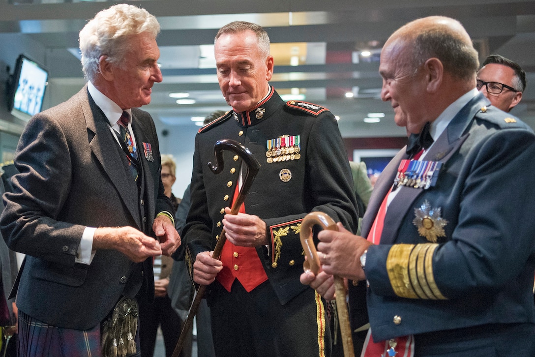 Marine Corps Gen. Joe Dunford receives a shepherd's crook.