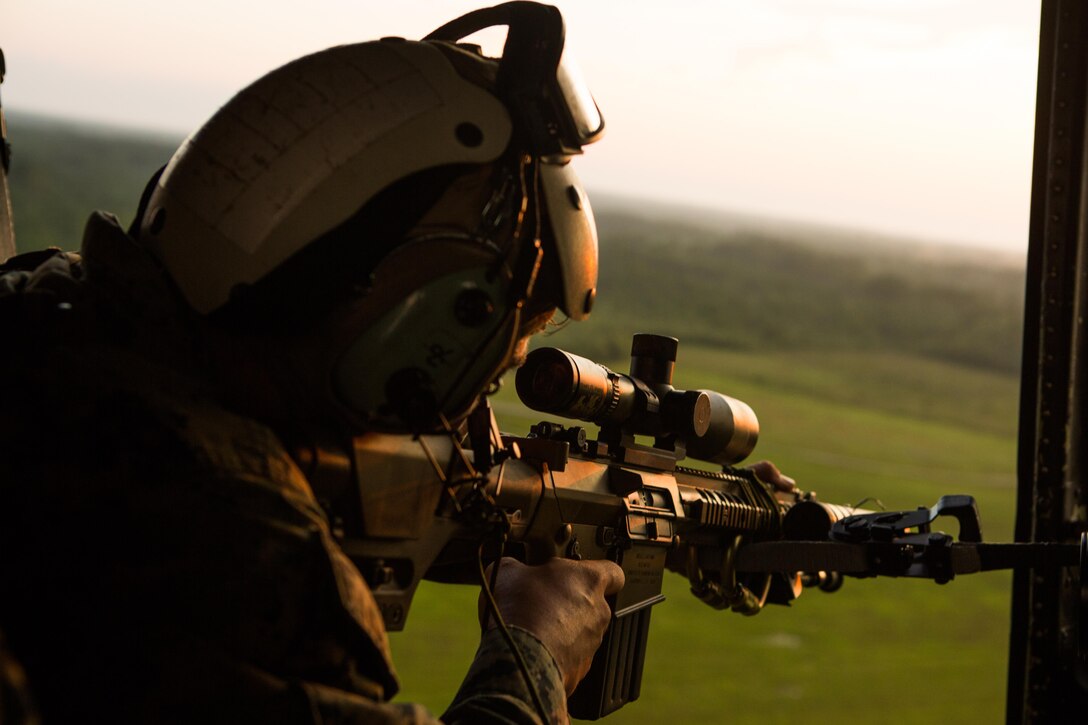 U.S. Marine Corps Sgt. Matthew T. Takojeff, a scout sniper with the Battalion Landing Team 2nd Battalion, 6th Marine Regiment, 26th Marine Expeditionary Unit (MEU), takes aim with an M110 Semi-Automatic Sniper System at a simulated target during aerial sniper training near Marine Corps Air Station New River, N.C., Aug. 19, 2017.