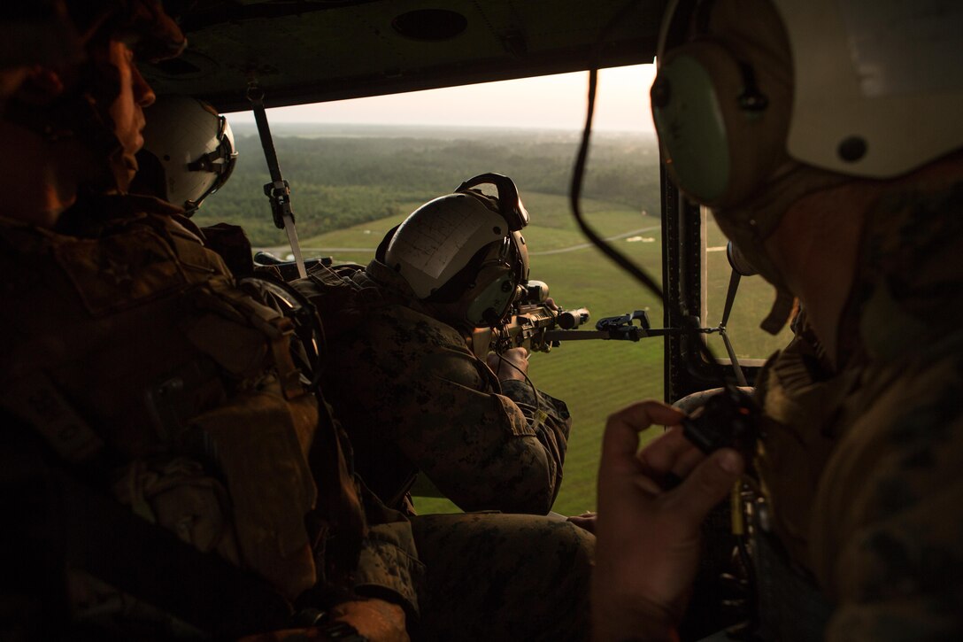 U.S. Marine Corps Sgt. Matthew T. Takojeff, a scout sniper with the Battalion Landing Team 2nd Battalion, 6th Marine Regiment, 26th Marine Expeditionary Unit (MEU), fires an M110 Semi-Automatic Sniper System at a simulated target during aerial sniper training near Marine Corps Air Station New River, N.C., Aug. 19, 2017.
