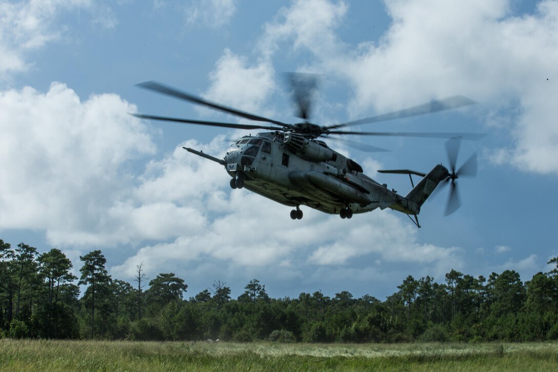 A U.S. Marine Corps CH-53E Super Stallion with Marine Medium Tiltrotor Squadron (VMM) 162 (Reinforced), 26th Marine Expeditionary Unit (MEU), prepares to land during Helicopter Support Team training at Camp Lejeune, N.C., Aug. 22, 2017.