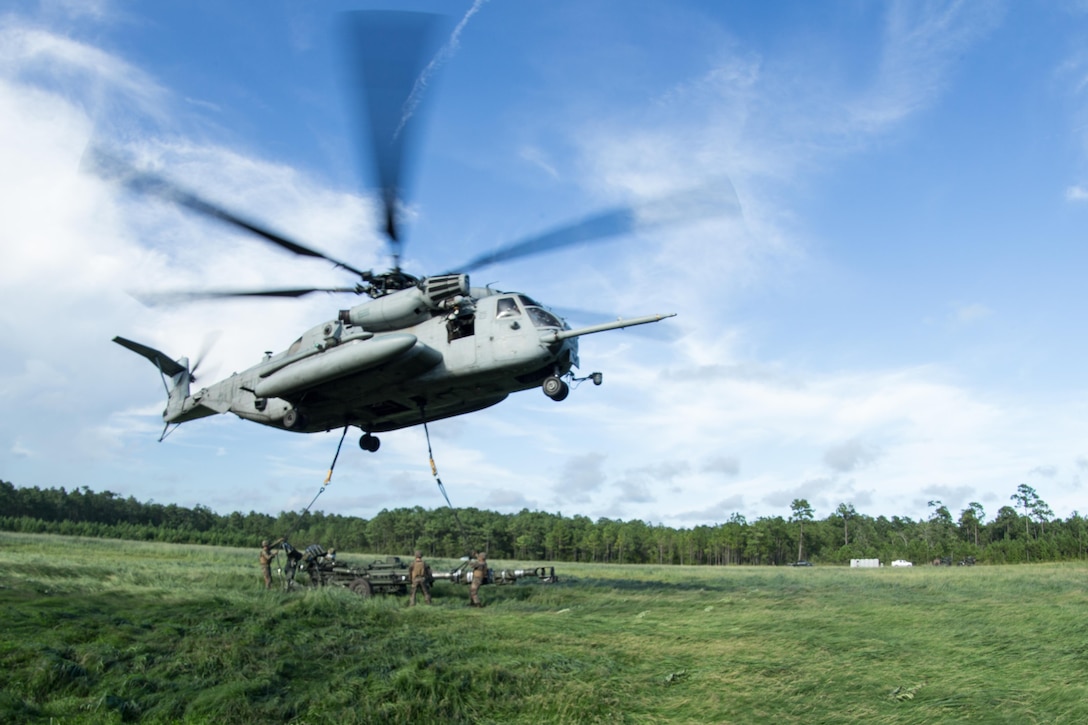 U.S. Marines with Combat Logistics Battalion 26, 26th Marine Expeditionary Unit (MEU), attach an M777 towed 155mm howitzer to a CH-53E Super Stallion with Marine Medium Tiltrotor Squadron (VMM) 162 (Reinforced), 26th MEU, during Helicopter Support Team training on Camp Lejeune, N.C., Aug. 22, 2017.