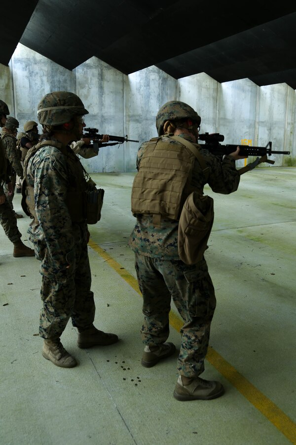 U.S. Marines with the Female Engagement Team (FET), 26th Marine Expeditionary Unit (MEU), conduct marksmanship training during Realistic Urban Training (RUT) at Stone Bay, N.C., Aug. 24, 2017. The event was part of a rehearsal by FET to enhance their training techniques as part of RUT, designed to provide the 26th MEU an opportunity to train in an unfamiliar environment in preparation for an upcoming deployment at sea. (U.S. Marine Corps photo by Cpl. Sylvia L. Tapia)