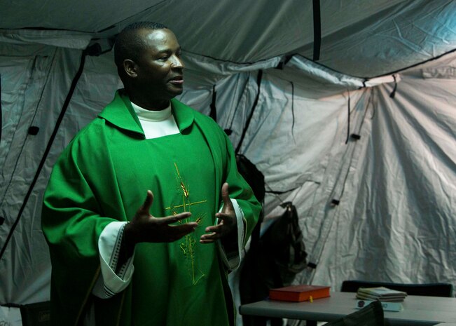 U.S. Navy Lt. Takana L. Jefferson, a chaplain with Battalion Landing Team (BLT) 2nd Battalion, 6th Marine Regiment, 26th Marine Expeditionary Unit (MEU), gives a sermon to Marines as part of religious services during Realistic Urban Training at Camp Davis Training Area, N.C., Aug. 20, 2017.