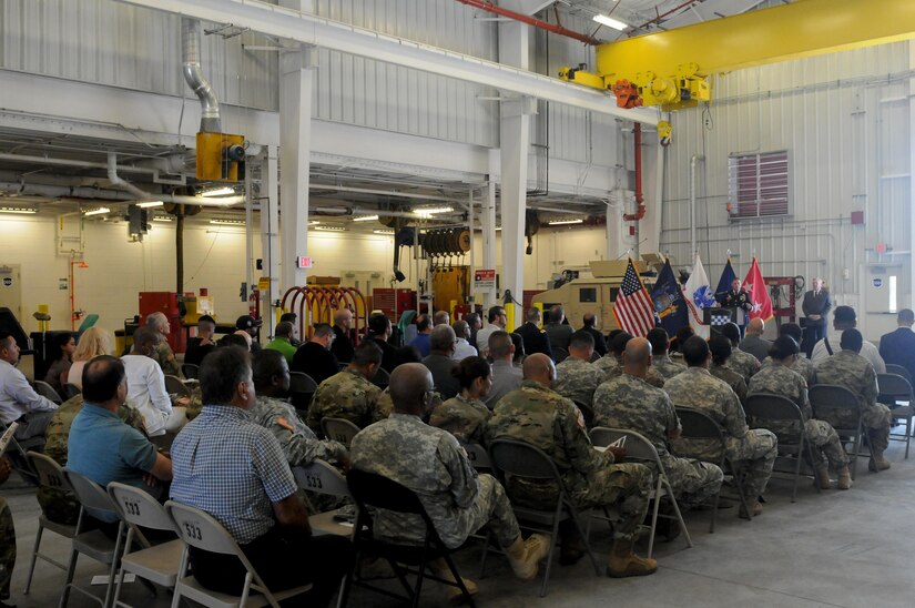 Maj. Gen. Troy D. Kok, commanding general of the U.S. Army Reserve’s 99th Regional Support Command, delivers remarks to military leaders, business partners and service members in attendance during the command’s ribbon-cutting ceremony Aug. 17 for the Area Maintenance Support Activity, Organizational Maintenance Shop, on Fort Totten, New York. The center underwent a $12.6 million full-facility revitalization, allowing technicians to perform in an up-to-date facility to meet readiness standards as well as train military unit mechanics as needed so they can perform maintenance while they’re deployed.