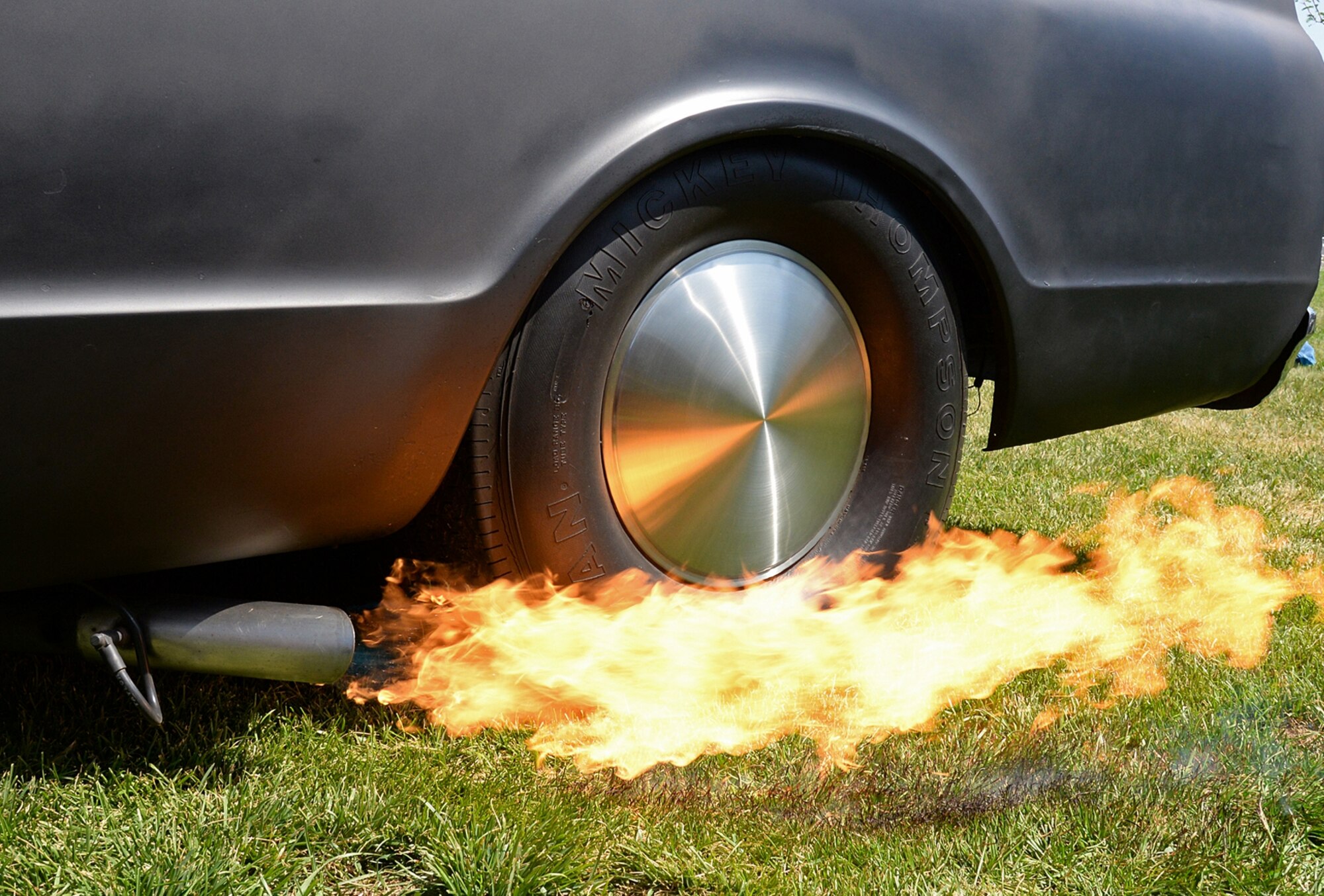 Scott Wolff, 309th Aircraft Maintenance Group plastic fabricator, shoots flames from his supercharged 1968 Chevrolet C-10 pickup. (U.S. Air Force photo by Alex R. Lloyd)
