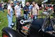 Stanley Bowen, 573rd Aircraft Maintenance Squadron F-16 mechanic (dark shirt), discusses his 1928 Ford Model “A” Roadster to gathered onlookers. (U.S. Air Force photo by Alex R. Lloyd)