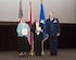 Cameron McDonald Vowell and William C. McDonald III, the daughter and son of the late William C. McDonald, accept the Distinguished Flying Cross and the Air Medal on behalf of their Father, Thursday, August 24, 2017, Maxwell Air Force Base, Ala. An awards ceremony was held to honor and award McDonald for his valor service during World War II. (U.S. Air Force photo/ Senior Airman Alexa Culbert)