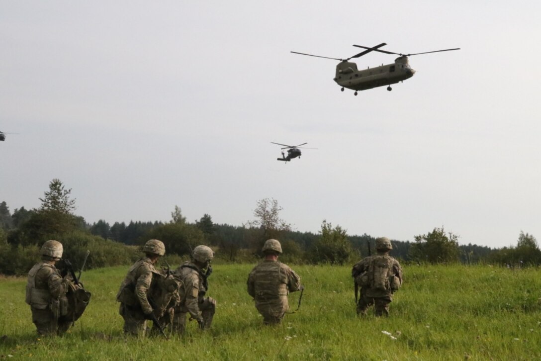 Infantrymen with Company A, 1st Battalion, 8th Infantry Regiment, 3rd Armored Brigade Combat Team, 4th Infantry Division, conduct an air assault.