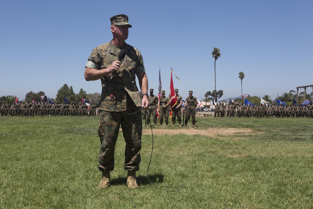 Sgt. Maj. Kevin F. Wiss, outgoing Headquarters and Headquarters Squadron sergeant major, presents remarks at his relief and appointment ceremony at Marine Corps Air Station Miramar, Calif., Aug. 17. Wiss relinquished his post to Sgt. Maj. Alfred R. Broadus. (U.S. Marine Corps Photo by Lance Cpl. Becky Calhoun/Released)