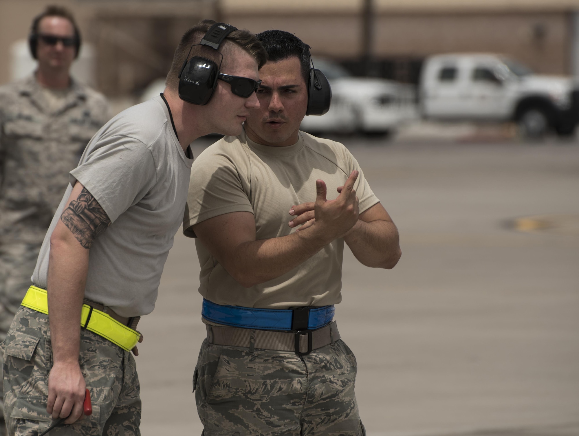 Staff Sgt. Marcos Cruz La Santa, right, 33rd Aircraft Maintenance Squadron avionics systems technician, trains an Airman pre-flight July 18, 2017, at Nellis Air Force Base, Nev. As one of the first core trained F-35 noncommissioned officers, Cruz has the unique perspective of working with fourth-generation maintainers while being able to connect with fifth-generation maintainers who have come through the training pipeline. (U.S. Air Force photo by Staff Sgt. Peter Thompson)
