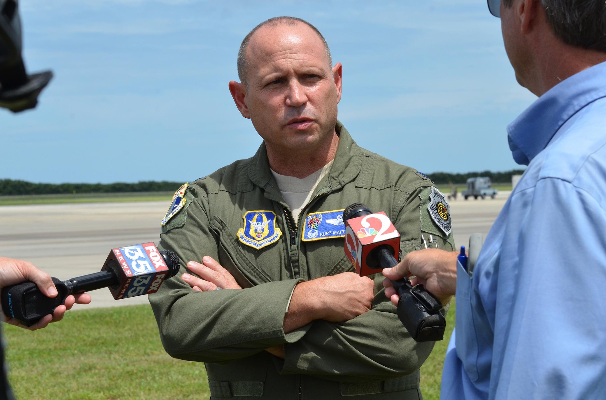 Col. Kurt Matthews, 920th Rescue Wing commander, interviews with media while a group of approximately 90 Citizen Airmen from the 920th RQW, Patrick Air Force Base, Florida, prepared take off for Texas to exercise their hurricane relief capabilities.The contingent included two HC-130P/N aerial refueling aircraft and three HH-60G Pave Hawk helicopters to Naval Air Station Ft. Worth Joint Reserve Base where Tenth Air Force Headquarters is located. If the Federal Emergency Management Agency or Air Combat Command gives the order to provide disaster relief following Hurricane Harvey’s devastating effects to the state, the 920th will be ready to help. (U.S. Air Force photo/Maj. Cathleen Snow)