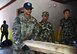 U.S. Army Sgt. Rajeev Neupane, 523rd Engineer Support Company, 130th Engineer Brigade interior electrician, carries lumber supplies at the Shree Mahendra Higher Secondary School during Pacific Angel (PACANGEL) 17-4 in Gorkha, Nepal, Aug. 18, 2017. PACANGEL is a multi-lateral humanitarian assistance civil military engagement, which improves military-to-military partnerships in the Pacific while also providing medical health outreach, civic engineering projects and subject matter exchanges among partner forces. (U.S. Air Force photo by Airman 1st Class Valerie Monroy)
